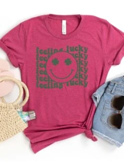 Feeling Lucky St. Patrick's Day Shamrock Smile Face T-Shirt Bella + Canvas Unisex Jersey Short Sleeve Tee -Sydney So Sweet FeelingLuckyHeatherRaspberry