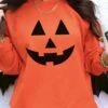 Jack-O-Lantern Face Unisex Heavy Blend Crewneck Embroidered Sweatshirt